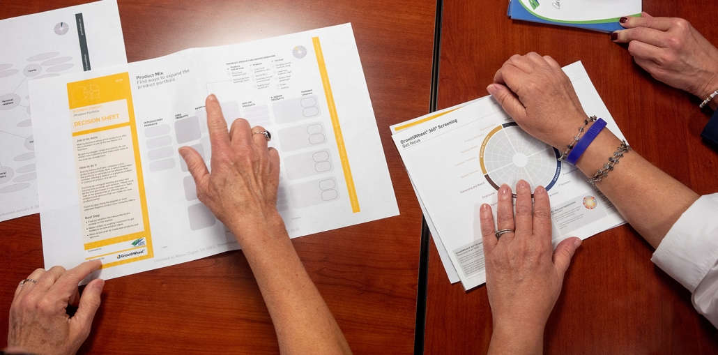 view of a desk with charts and graphs