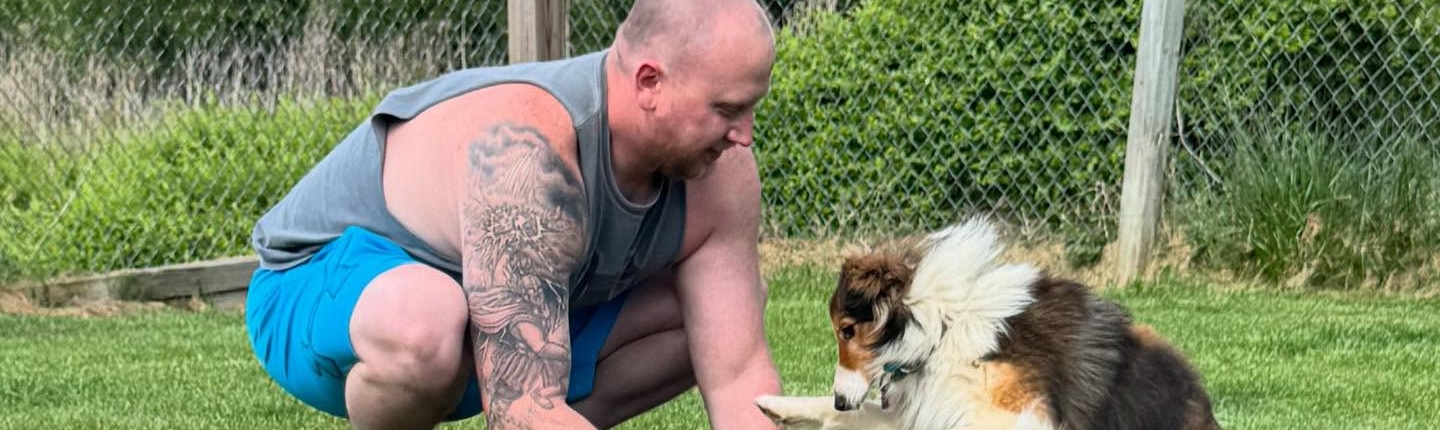 Dustin Shull and Rivana the Dog